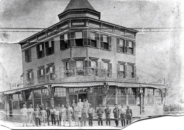 The Ocean Ave. Hotel in Brooklyn, owned by the Hasselmann family, with a group of men standing out front